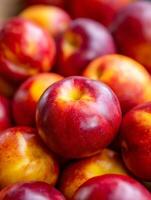 Close Up of Ripe Nectarines, Juicy Summer Fruit. photo