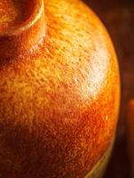 Close up of a Golden Brown Crusty Surface Texture. A detailed image perfect for backgrounds, textures, or food photography. photo