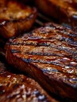 Close Up of Juicy Grilled Steaks, Sizzling on the Grill. photo
