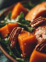 Close up of Roasted Butternut Squash and Pecan Salad. photo