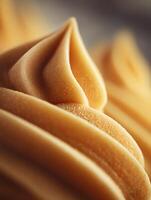 Close Up of Creamy Caramel Ice Cream Swirls, Delicious Dessert Texture. photo