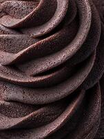 Close Up of Swirled Chocolate Ice Cream, Rich and Creamy Texture. photo