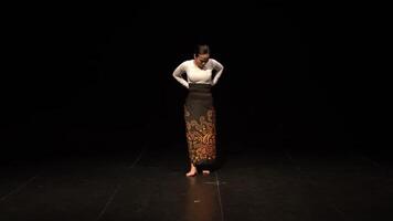 Dancer Performing in Traditional Attire on Stage video