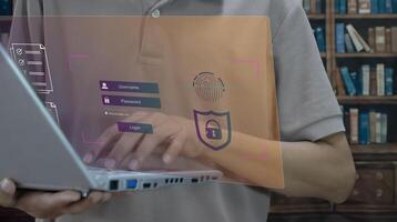 Man typing on keyboard with login name and password on screen display. Concept of cyber security, data protection and secure internet access. photo