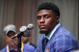 Georgia Bulldogs line backer CJ Allen answers questions from the media during SEC Media Days at Omni Atlanta Hotel. editorial_image