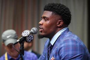 Georgia Bulldogs line backer CJ Allen answers questions from the media during SEC Media Days at Omni Atlanta Hotel. editorial_image