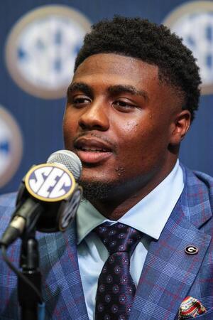 Georgia Bulldogs line backer CJ Allen answers questions from the media during SEC Media Days at Omni Atlanta Hotel. editorial_image