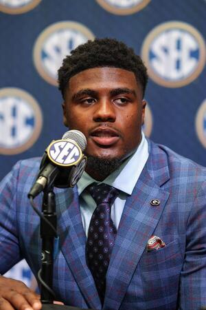 Georgia Bulldogs line backer CJ Allen answers questions from the media during SEC Media Days at Omni Atlanta Hotel. editorial_image