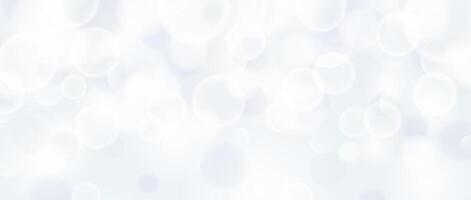 Abstract circle bokeh background. Smooth soft grey blur effect wallpaper. Shiny silver blue blurry sparkles texture. Seasonal backdrop for Christmas, New Year or birthday card, poster, banner. vector