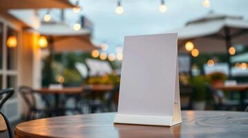 Blank menu on table in restaurant photo