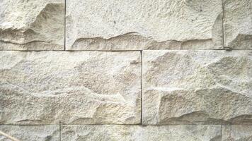 close up Stone tile wall texture pattern background photo