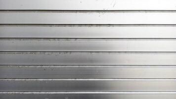 Metal door roll up texture background. photo