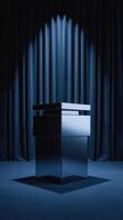 Minimalist podium displayed under spotlight with dramatic lighting and dark curtain background perfect for theatrical and luxury design. photo