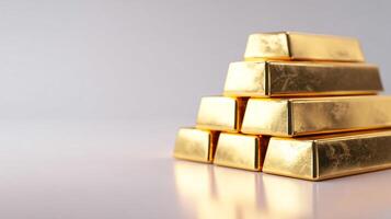Gold Bullion on Desk with Blurred Office Background photo