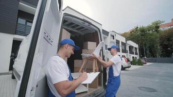 Worker Checking Shipment Against Clipboard List video