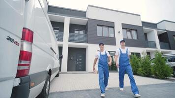 Delivery workers preparing boxes for transport video