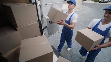 Worker Entering Delivery Van to Retrieve Shipment video