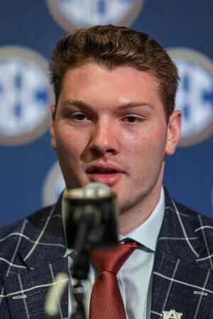 Auburn Tigers offensive lineman Connor Lew answers questions from the media during SEC Media Days at Omni Atlanta Hotel. editorial_image