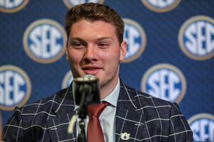 Auburn Tigers offensive lineman Connor Lew answers questions from the media during SEC Media Days at Omni Atlanta Hotel. editorial_image