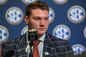 Auburn Tigers offensive lineman Connor Lew answers questions from the media during SEC Media Days at Omni Atlanta Hotel. editorial_image