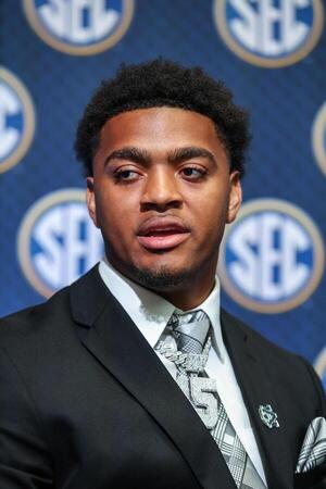 Auburn Tigers defensive lineman Keldric Faulk answers questions from the media during SEC Media Days at Omni Atlanta Hotel. editorial_image