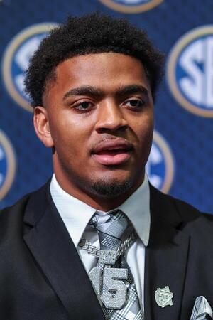Auburn Tigers defensive lineman Keldric Faulk answers questions from the media during SEC Media Days at Omni Atlanta Hotel. editorial_image
