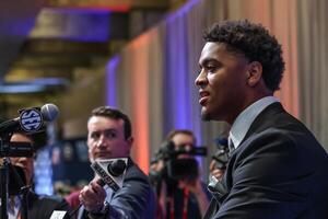 Auburn Tigers defensive lineman Keldric Faulk answers questions from the media during SEC Media Days at Omni Atlanta Hotel. editorial_image