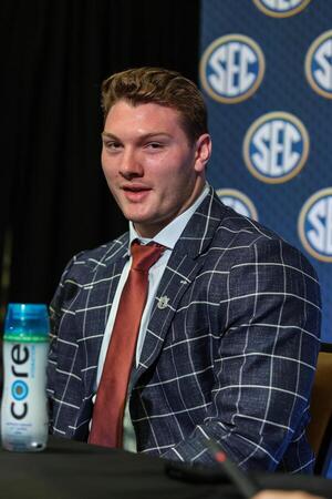 Auburn Tigers offensive lineman Connor Lew answers questions from the media during SEC Media Days at Omni Atlanta Hotel. editorial_image
