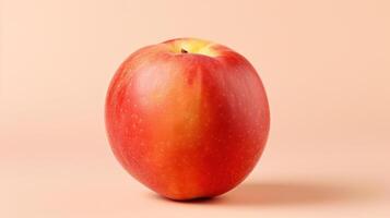 A vibrant red apple against a light background. photo