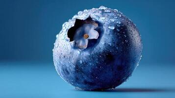 Close-up of a juicy blueberry with water droplets. photo