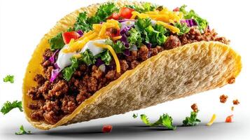 Delicious taco with meat, cheese, lettuce, and toppings. photo