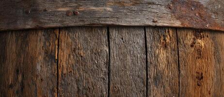 An old wooden barrel with rust on it photo
