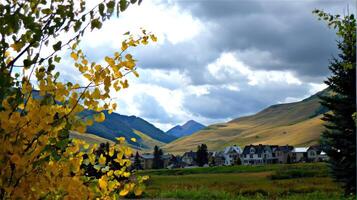 A view of a mountain range with a town in the background photo