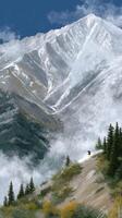 A painting of a mountain with snow on it photo