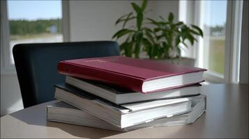 A stack of books on a table photo