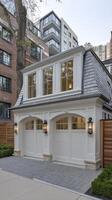 A two story garage with a large window photo
