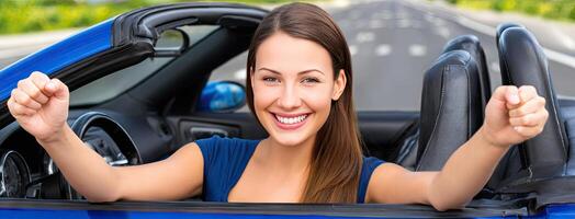 A woman is smiling in her car photo