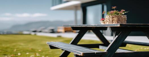 A picnic table on a lawn photo