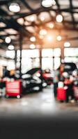 Automotive service center with cars and people in the background photo