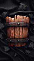 A wooden barrel with black rocks on it photo