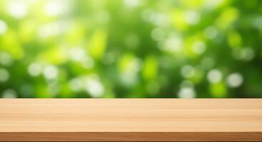 Empty wooden table top over green blurred background photo