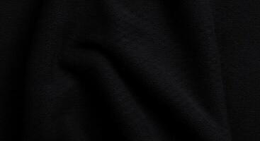 A black fabric with a dark color photo