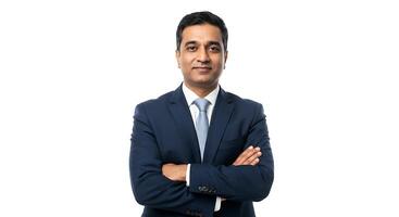 A man in a suit and tie standing with his arms crossed photo
