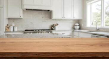 Empty wooden table in kitchen with white cabinets photo