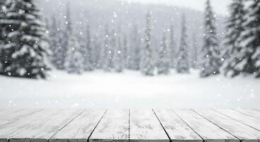 Wooden table top in snowy forest with snow falling photo