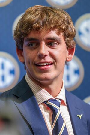 Texas Longhorns quarterback Arch Manning answers questions from the media during SEC Media Days at Omni Atlanta Hotel. editorial_image