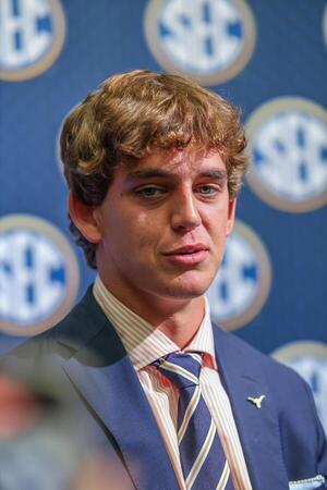 Texas Longhorns quarterback Arch Manning answers questions from the media during SEC Media Days at Omni Atlanta Hotel. editorial_image