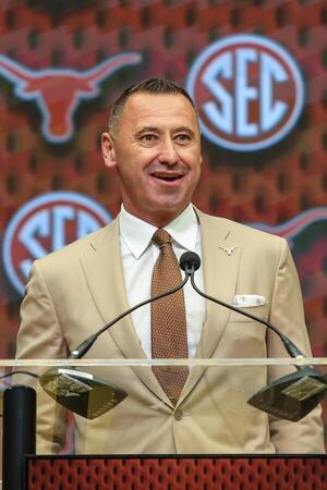Texas Longhorns head coach Steve Sarkisan talks to the media during SEC Media Days at Omni Atlanta Hotel. editorial_image