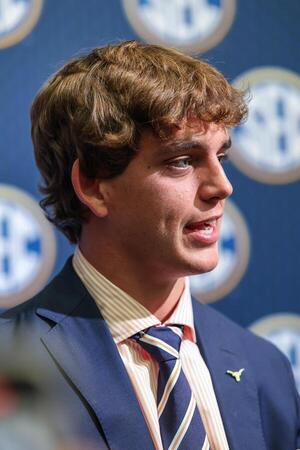 Texas Longhorns quarterback Arch Manning answers questions from the media during SEC Media Days at Omni Atlanta Hotel. editorial_image
