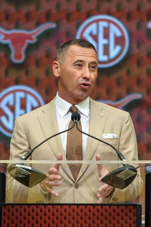 Texas Longhorns head coach Steve Sarkisan talks to the media during SEC Media Days at Omni Atlanta Hotel. editorial_image